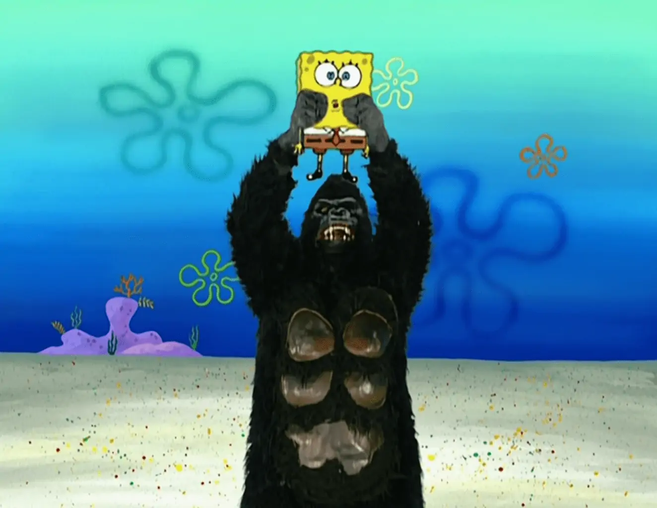 gorilla lifts spongebob up