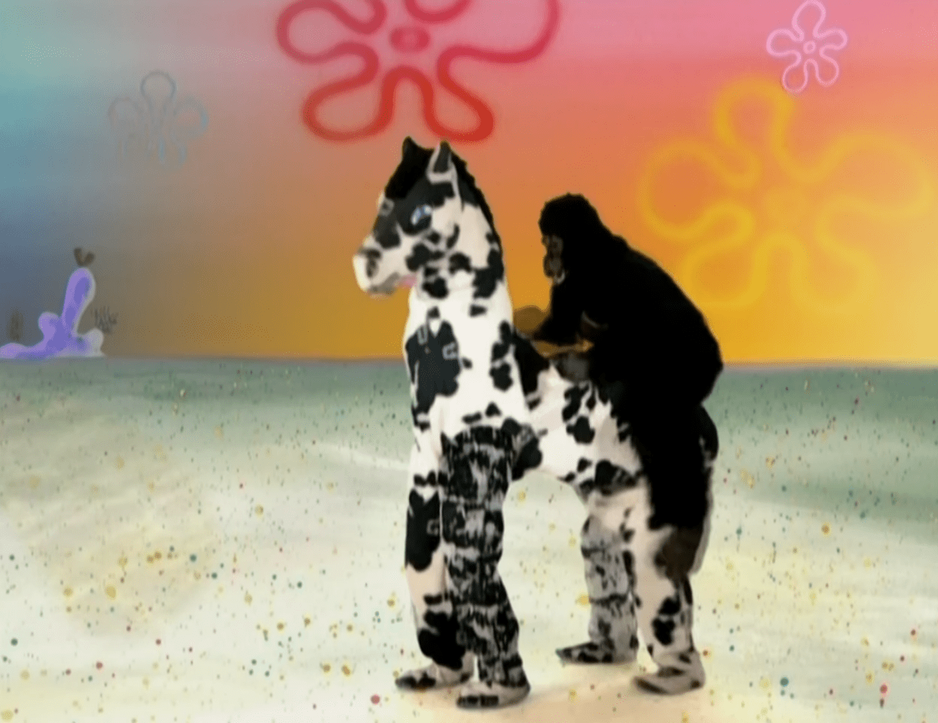 gorilla running away on its pony george